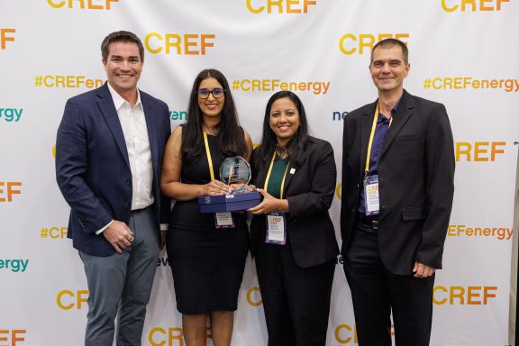 Four CUC team members smile while holding an award at the 2025 CREF Conference. From left to right: Sacha Tibbetts, Purdy Gouveia, Namitha Abraham, and Cedric Worthmann.